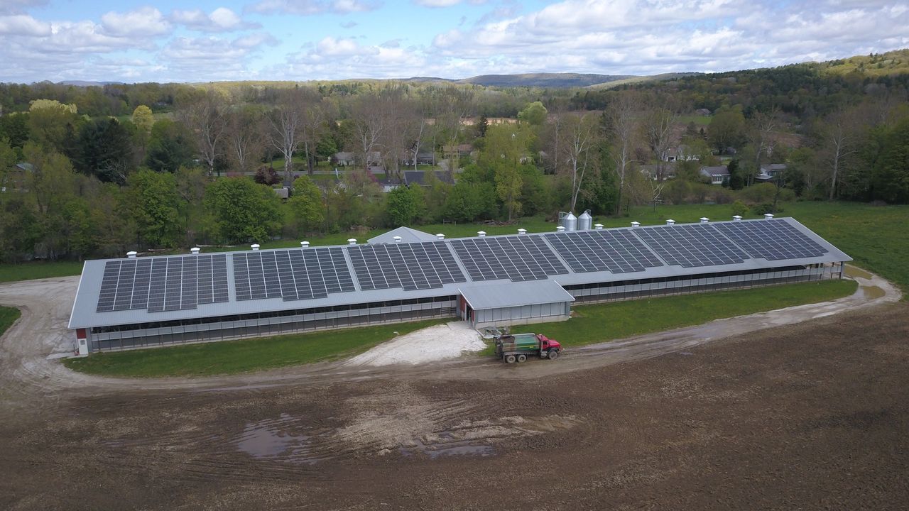 Aerial view of dairy barn and manure truck