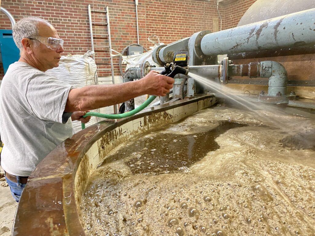 farmer blends manure into water